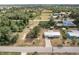 Aerial view of the home showcasing its lot size, landscaping, and neighborhood at 200 Summerset Dr, Punta Gorda, FL 33982