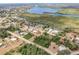A distant aerial view displaying a property with waterfront views and a cozy neighborhood at 200 Summerset Dr, Punta Gorda, FL 33982