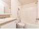 Bathroom featuring a shower-tub combination and a single sink vanity at 200 Summerset Dr, Punta Gorda, FL 33982