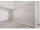 Bedroom featuring neutral carpet and a window for natural light at 200 Summerset Dr, Punta Gorda, FL 33982