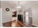 Inviting dining room with wood floors leading to the kitchen and other living spaces at 200 Summerset Dr, Punta Gorda, FL 33982