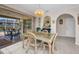 Cozy dining room with wicker table and chairs with sliding door to patio area at 20355 Mount Prospect Ave, Port Charlotte, FL 33952