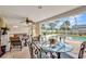 Enjoy the screened lanai overlooking the pool, complete with an outdoor dining area and seating at 20355 Mount Prospect Ave, Port Charlotte, FL 33952