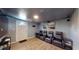 Basement movie room with theater seating, creating a perfect space for entertaining and relaxation at 20407 Albury Dr, Port Charlotte, FL 33952
