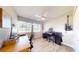 A spare bedroom makes a great music studio with a desk, guitars, and piano at 20407 Albury Dr, Port Charlotte, FL 33952
