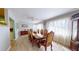 Bright dining room featuring an expansive table set, elegant decor and lots of natural light at 20407 Albury Dr, Port Charlotte, FL 33952