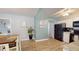 Bright and airy kitchen featuring open layout to dining area and modern appliances at 20407 Albury Dr, Port Charlotte, FL 33952