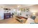 Inviting living room with fireplace, comfortable seating, and decor elements at 20407 Albury Dr, Port Charlotte, FL 33952