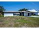 Home with a carport and expansive front yard at 2113 Barksdale St, Port Charlotte, FL 33948