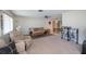 Spacious living area features couches, coffee table and easy access to the dining space at 2113 Barksdale St, Port Charlotte, FL 33948
