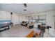 A well-lit living room showcases comfortable seating, creating a cozy and inviting space for relaxation at 2113 Barksdale St, Port Charlotte, FL 33948