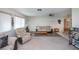 A spacious living room offers ample seating and natural light, creating a comfortable and inviting atmosphere at 2113 Barksdale St, Port Charlotte, FL 33948