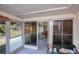 Enclosed patio offers an extension of indoor living space with sliding doors and outside views at 2113 Barksdale St, Port Charlotte, FL 33948