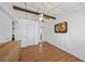 Third angle showing a bedroom featuring wood-look flooring and closet space at 2321 Dallas St, Port Charlotte, FL 33952