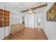 Second angle showing a bedroom featuring wood-look flooring and closet space at 2321 Dallas St, Port Charlotte, FL 33952