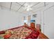 Well-lit bedroom with hard wood floors, neutral paint and ceiling fan at 2321 Dallas St, Port Charlotte, FL 33952