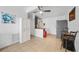 Well-lit kitchen featuring tile floors, modern appliances, and a cozy breakfast bar at 2321 Dallas St, Port Charlotte, FL 33952