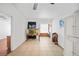 Bright living room with tiled flooring and large window, creating an airy atmosphere at 2321 Dallas St, Port Charlotte, FL 33952