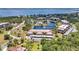 Overhead view showcasing the community with a lake, water features, mature trees, and easy access to the ocean at 23465 Harborview Rd # 1002, Punta Gorda, FL 33980