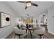 Bright living and dining area with neutral tones, modern furnishings, and view of bedroom and sliding glass doors at 23465 Harborview Rd # 1002, Punta Gorda, FL 33980
