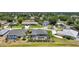This aerial view highlights a home's private backyard oasis complete with pool and screened-in patio at 25273 Paraguay St, Punta Gorda, FL 33983