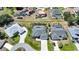 Aerial view of homes in a well-planned community, showcasing backyard pools at 25273 Paraguay St, Punta Gorda, FL 33983