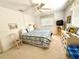 Bright bedroom with ceiling fan at 261 Caddy Rd, Rotonda West, FL 33947