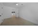Bright bedroom featuring tiled floors, white walls and trim, and a ceiling fan at 27385 Voyageur Dr, Punta Gorda, FL 33983