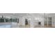Open living area with bright, neutral paint, recessed lighting and kitchen access at 27385 Voyageur Dr, Punta Gorda, FL 33983