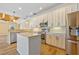 Beautiful kitchen with stainless steel appliances and hardwood floors at 2871 Suncoast Lakes Blvd, Punta Gorda, FL 33980