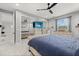 Spacious bedroom boasts a mirrored closet, comfortable bed, and serene views from the large window at 3544 Monfero Ave, North Port, FL 34286