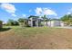 Charming home features a spacious two-car garage and a dry lawn at 3544 Monfero Ave, North Port, FL 34286