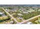 From above, view of development, and adjacent green vegetation at 3927 Vasco St, Punta Gorda, FL 33950