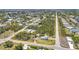 Drone-eye view, showing property lines, and lush tropical vegetation at 3927 Vasco St, Punta Gorda, FL 33950