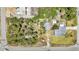 Aerial view of the property and its surroundings, showcasing the landscaping and neighborhood at 3927 Vasco St, Punta Gorda, FL 33950