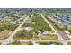 An elevated aerial view of the community, with roads and lush trees at 3927 Vasco St, Punta Gorda, FL 33950