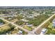 Aerial perspective of a developing community with houses and road access at 3927 Vasco St, Punta Gorda, FL 33950