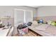 Bedroom area with desk, bed and natural light; ready for renovation at 3927 Vasco St, Punta Gorda, FL 33950