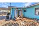 Side view of the home featuring an outdoor shower, providing a refreshing space to rinse off after enjoying outdoor activities at 3927 Vasco St, Punta Gorda, FL 33950