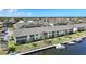 Scenic aerial view of a waterfront community with canals, boat docks, and condo buildings at 4000 E Bal Harbor Blvd. E. #211 # 211, Punta Gorda, FL 33950