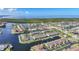 Aerial view of a residential community with canals, waterfront properties, and lush landscaping at 4000 E Bal Harbor Blvd. E. #211 # 211, Punta Gorda, FL 33950