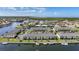 Panoramic aerial view of waterfront condos surrounded by lush landscaping and scenic canals at 4000 E Bal Harbor Blvd. E. #211 # 211, Punta Gorda, FL 33950