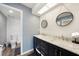 Elegant bathroom boasts a double vanity with marble countertop and stylish mirrors at 4000 E Bal Harbor Blvd. E. #211 # 211, Punta Gorda, FL 33950
