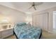 Relaxing bedroom featuring a double bed, ceiling fan, and a spacious closet at 4000 E Bal Harbor Blvd. E. #211 # 211, Punta Gorda, FL 33950
