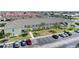 Exterior shot of a condo building with parking and landscaping at 4000 E Bal Harbor Blvd. E. #211 # 211, Punta Gorda, FL 33950