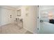 Inviting foyer featuring tile flooring, glass table, and access to the living areas at 4000 E Bal Harbor Blvd. E. #211 # 211, Punta Gorda, FL 33950