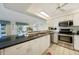 Bright kitchen with granite countertops and stainless steel appliances at 4000 E Bal Harbor Blvd. E. #211 # 211, Punta Gorda, FL 33950