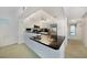 Modern kitchen with black countertops and stainless steel appliances at 4000 E Bal Harbor Blvd. E. #211 # 211, Punta Gorda, FL 33950