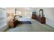Comfortable bedroom with plush bedding, ample natural light, and classic wood furniture at 4000 E Bal Harbor Blvd. E. #211 # 211, Punta Gorda, FL 33950