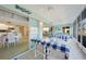 Inviting sunroom with checkered chairs, offering panoramic views and seamless indoor-outdoor living at 4000 E Bal Harbor Blvd. E. #211 # 211, Punta Gorda, FL 33950